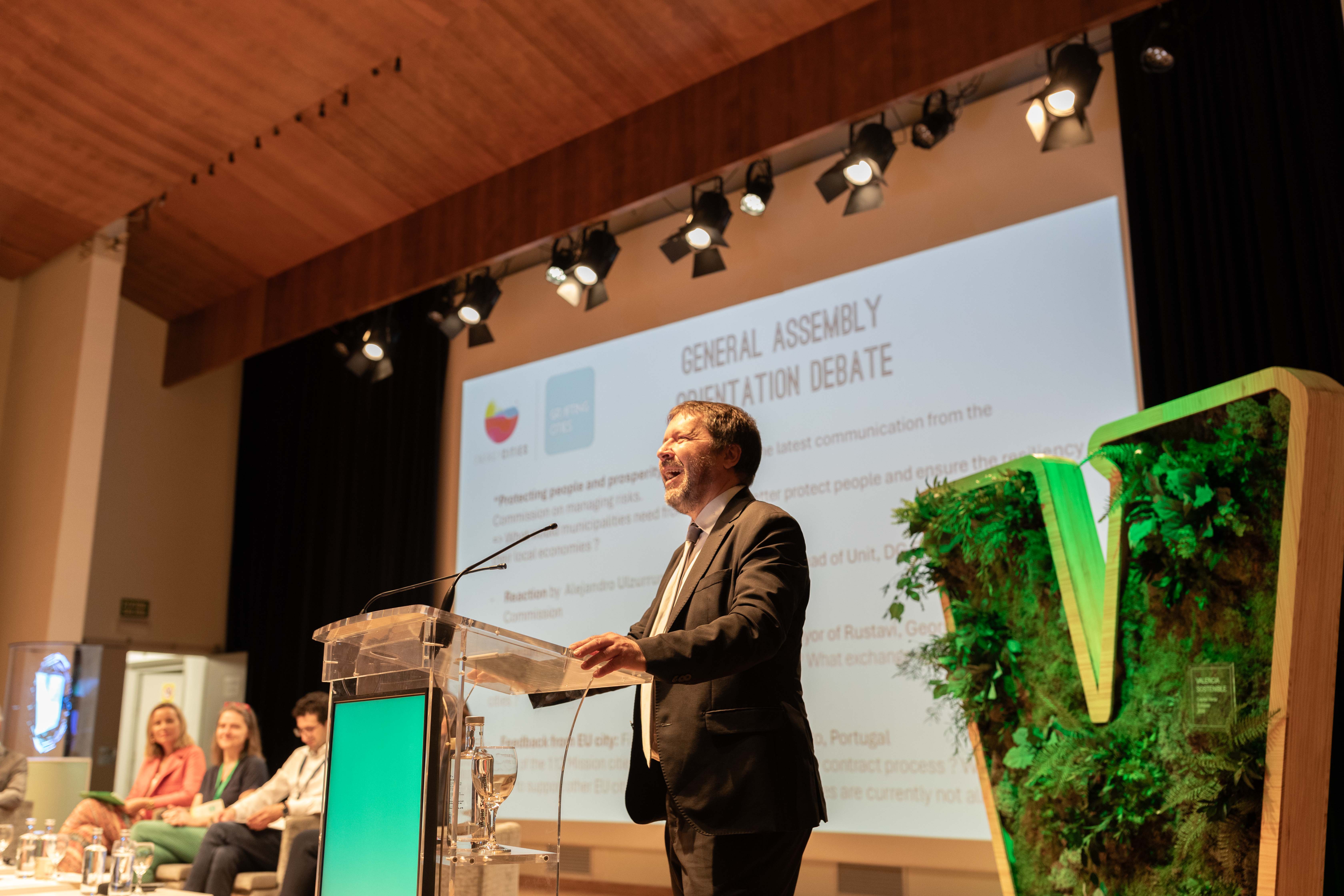 a man standing at a podium