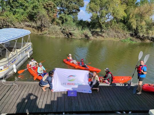 people in kayak in a river celebrating world rivers day