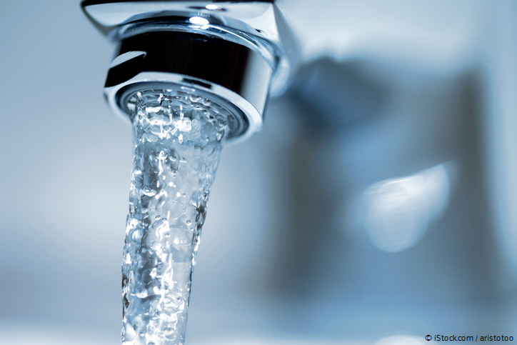 Water coming out of faucet.